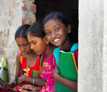 stock-photo-school-students-girls-using-laptop-while-studying-at-home-2239009697-transformed